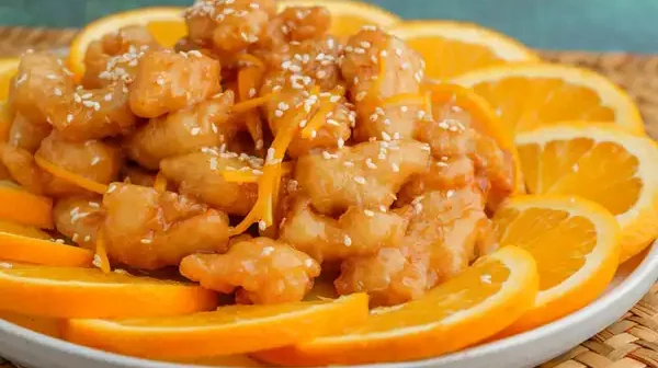 sesame chicken vs orange chicken, orange chicken vs sesame chicken, sesame vs orange chicken, orange vs sesame chicken, difference between orange chicken and sesame chicken